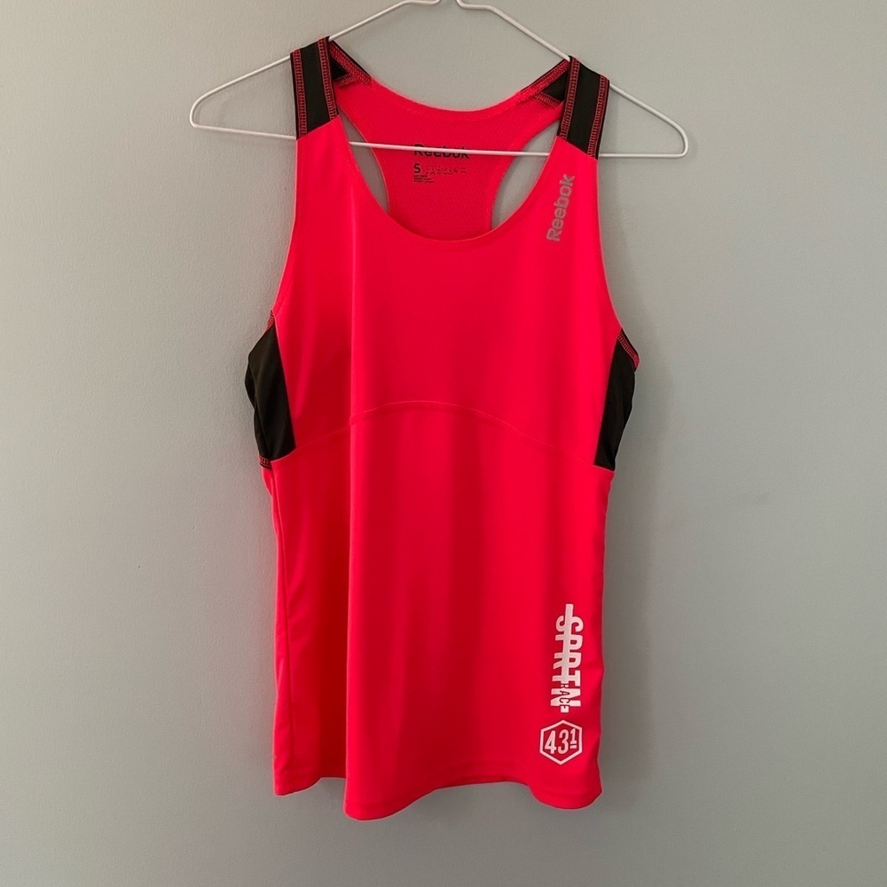 Reebok Spartan tank top, orange, size small.‎